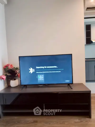 Modern living room with sleek TV setup and stylish decor