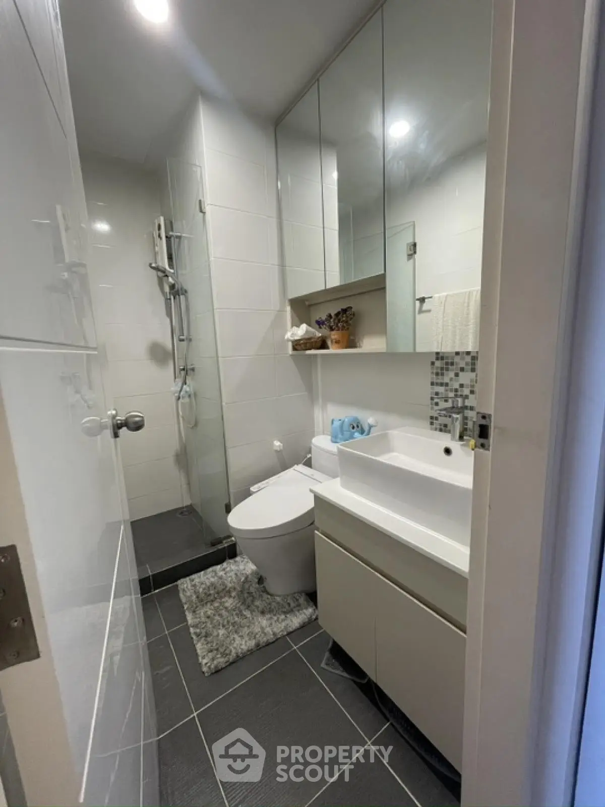 Modern compact bathroom with sleek fixtures and stylish design