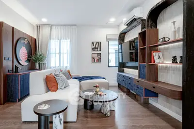 Modern living room with stylish decor and cozy seating area