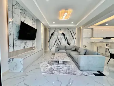 Luxurious modern living room with marble accents and sleek furniture