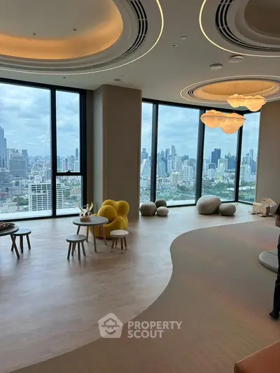 Luxurious high-rise living room with panoramic city views and modern decor.