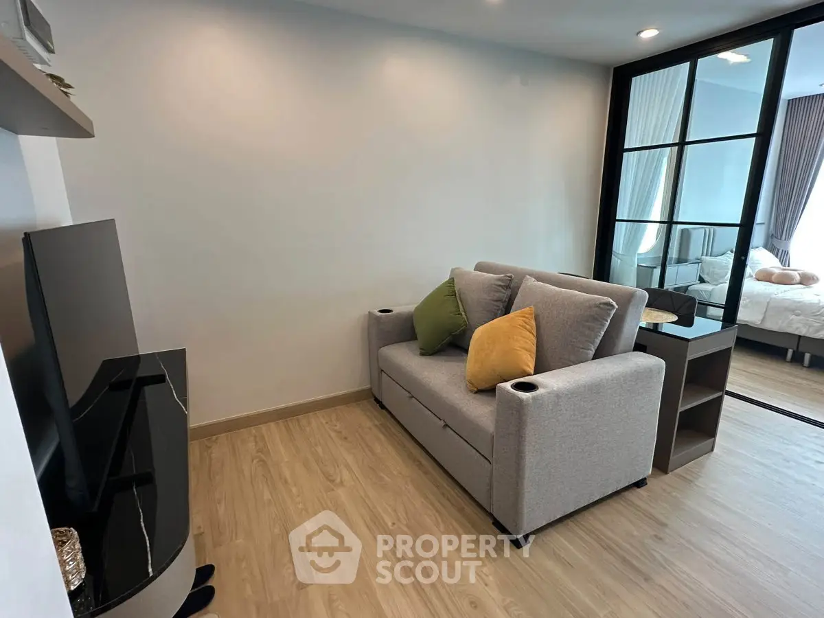 Modern living room with sleek design and cozy sofa in a stylish apartment