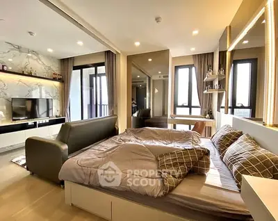 Modern studio apartment with stylish decor and natural light