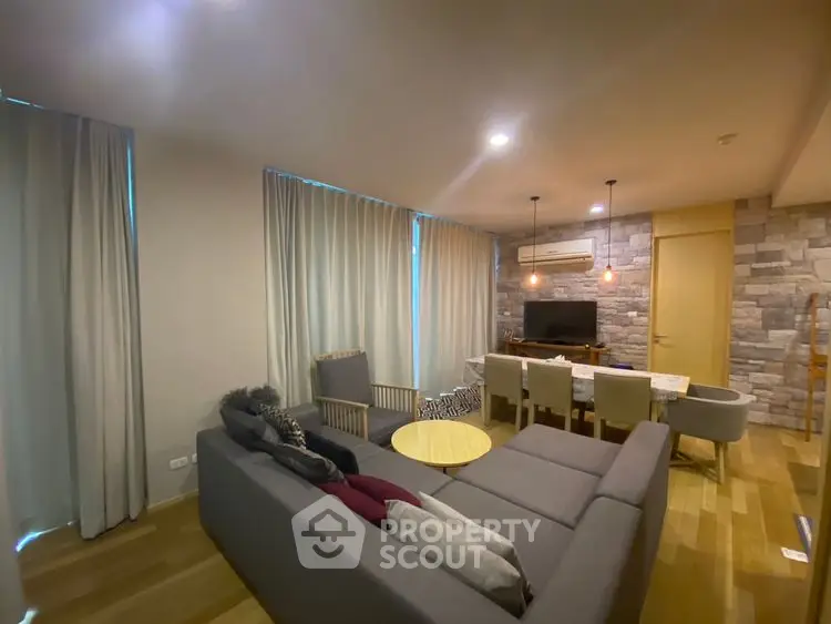 Modern living room with stylish furniture and ambient lighting