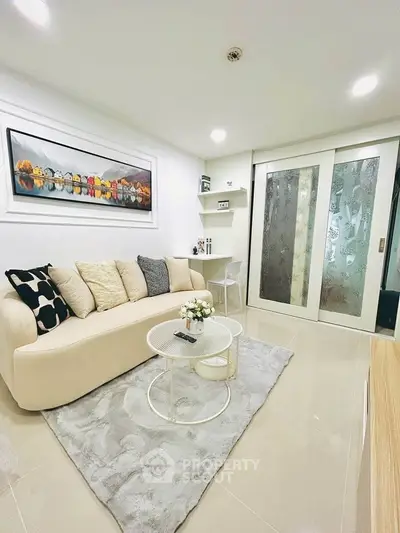 Modern living room with elegant decor and cozy seating area