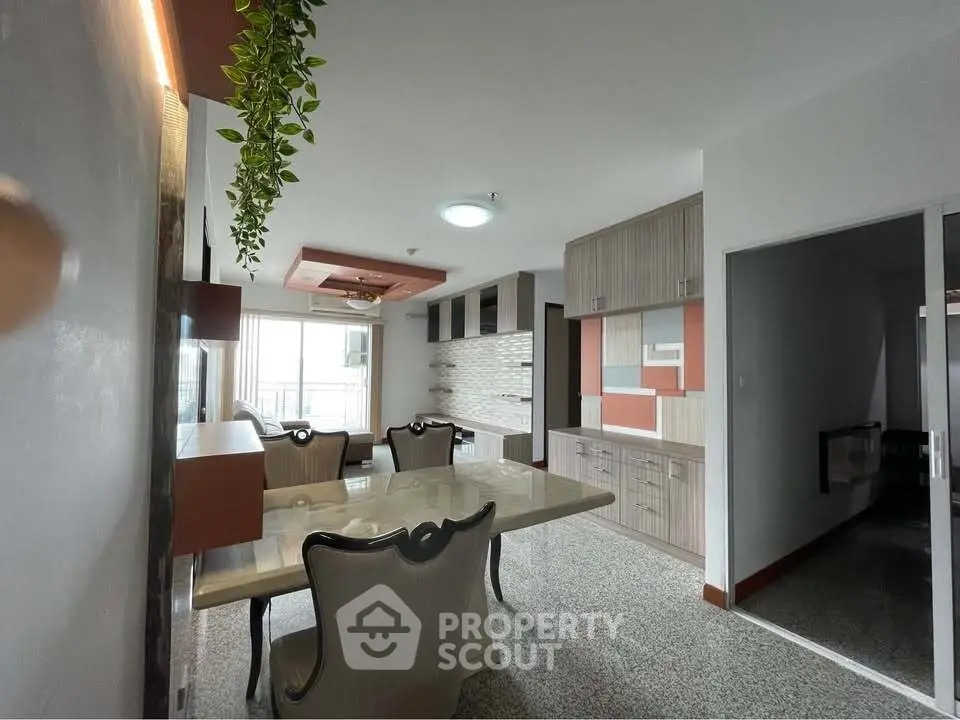 Spacious dining area with modern decor and ample natural light