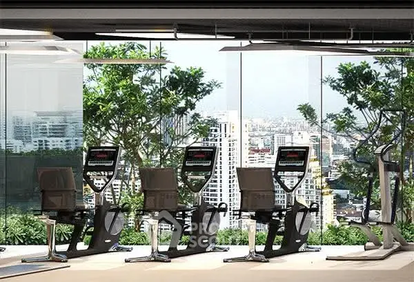 Modern gym with city view and state-of-the-art equipment