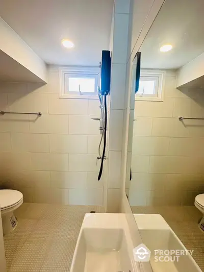 Modern bathroom with sleek fixtures and natural light