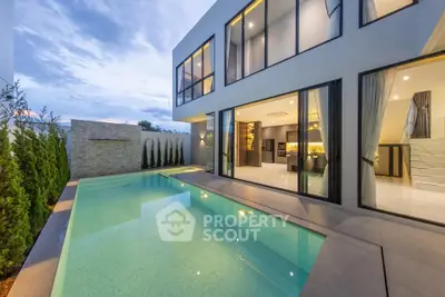 Luxurious modern home with stunning pool and elegant exterior design