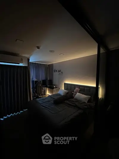 Cozy bedroom with ambient lighting and modern decor