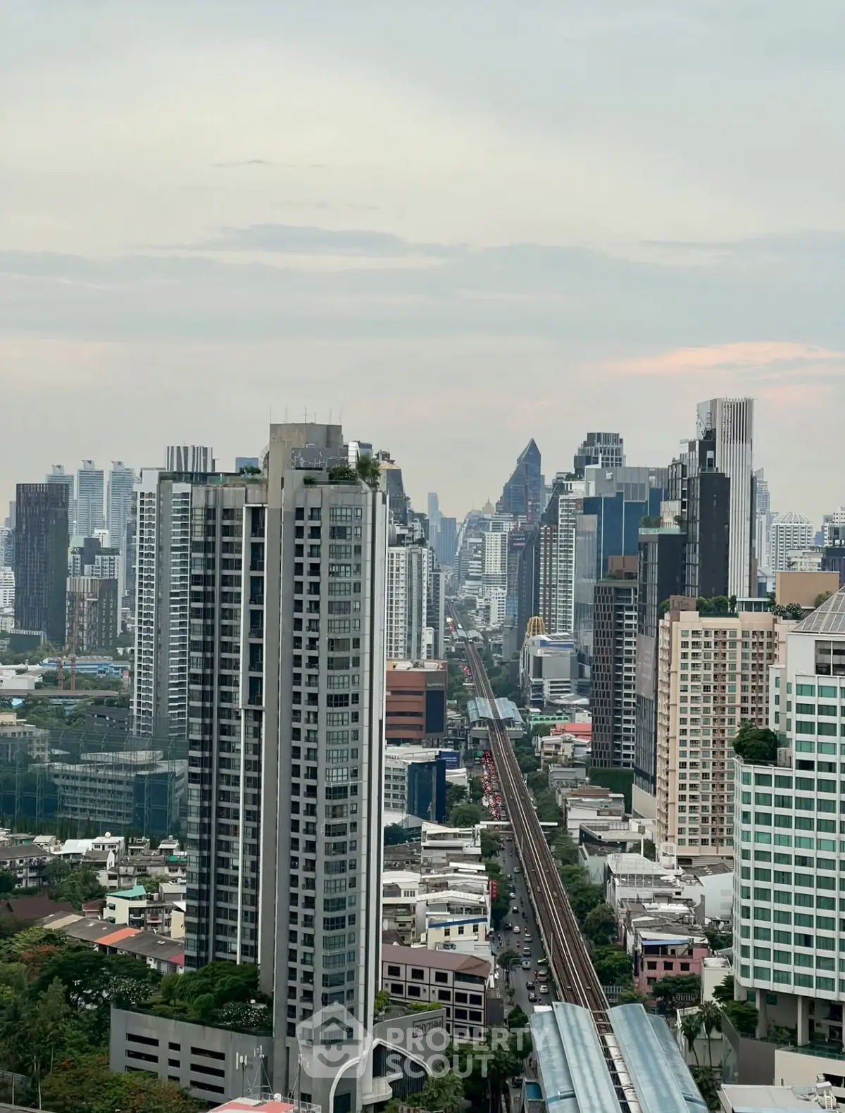 Stunning cityscape view with modern skyscrapers and urban skyline, perfect for real estate investment.