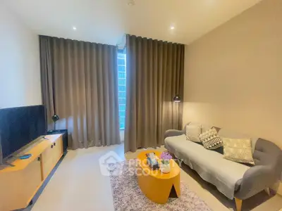 Cozy living room with modern decor and large window view