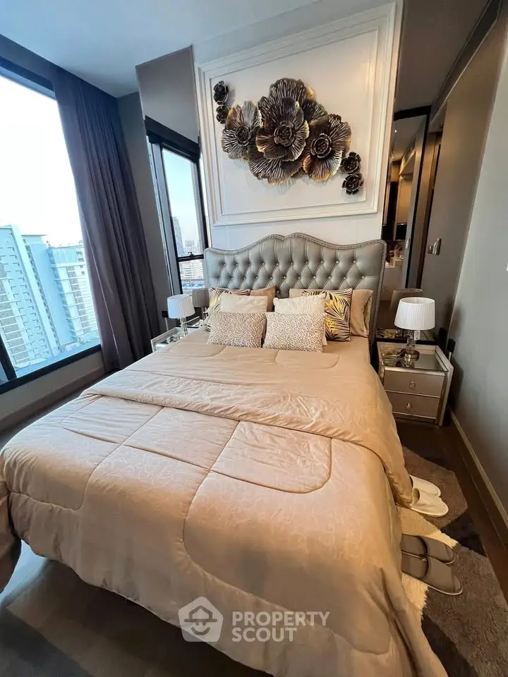 Luxurious bedroom with elegant decor and city view in modern apartment