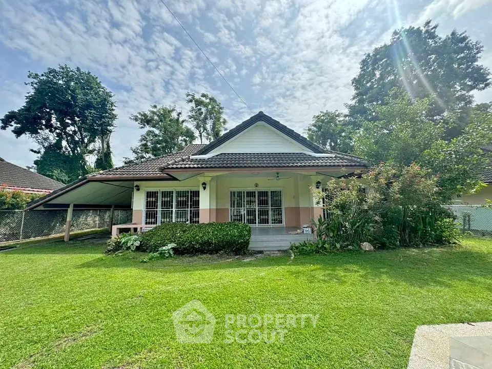 Charming single-story house with lush garden and spacious front yard