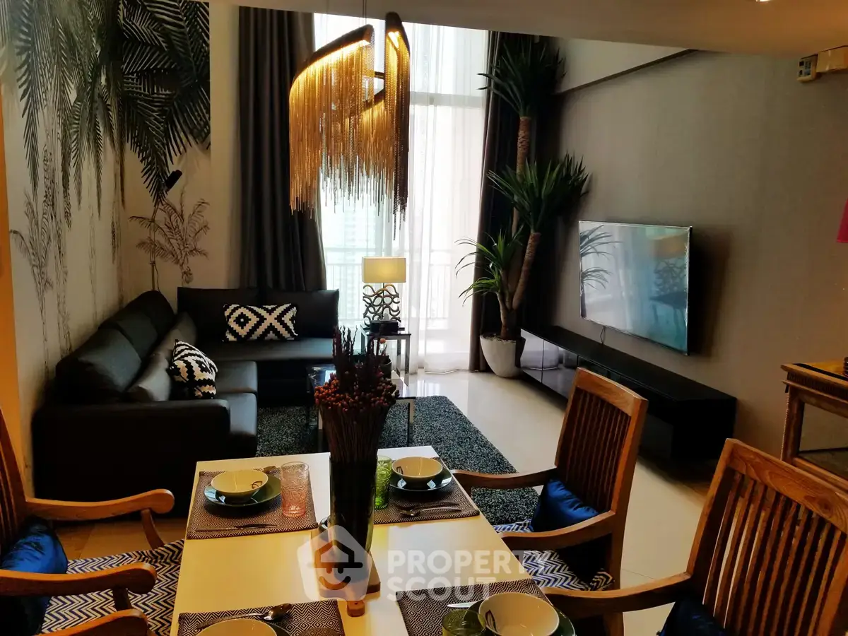 Stylish living room with modern decor, large windows, and elegant dining area.