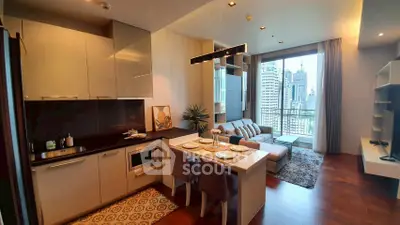 Modern open-plan living room with kitchen, featuring city view and stylish decor.