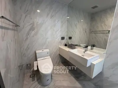 Modern bathroom with sleek design and marble finishes