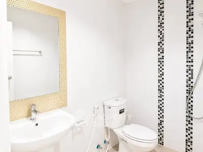Modern bathroom with stylish tile accents and sleek fixtures