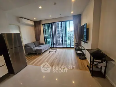 Modern living room with sleek design and city view, featuring a cozy sofa and wall-mounted TV.