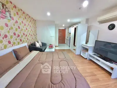 Spacious studio apartment with modern decor and cozy furnishings