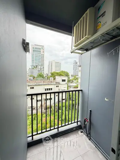 Modern balcony with city view, perfect for urban living enthusiasts seeking a serene outdoor space.