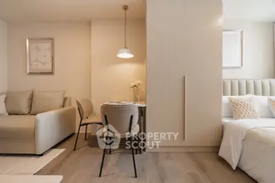 Modern studio apartment with cozy living area and stylish decor