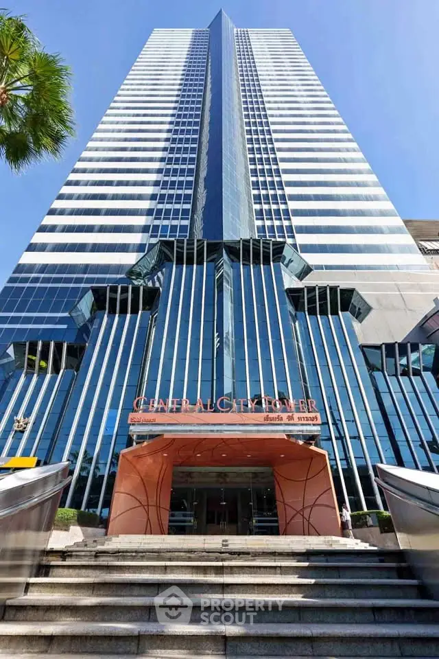 Stunning skyscraper with modern architecture and glass facade in prime city location.