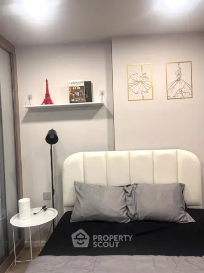 Modern bedroom with stylish decor and cozy ambiance