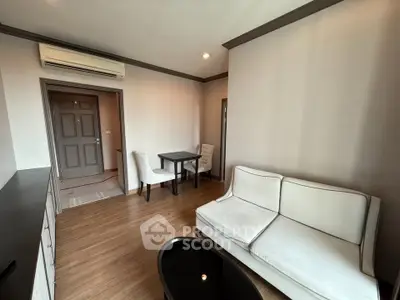 Cozy living room with modern furniture and wooden flooring