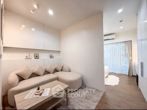 Modern living room with cozy sofa and elegant decor in a stylish apartment