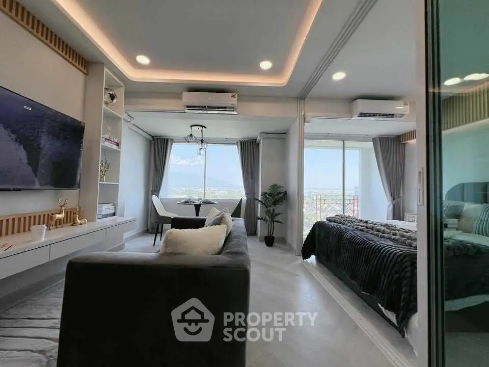 Modern open-plan living room with stunning view and elegant decor