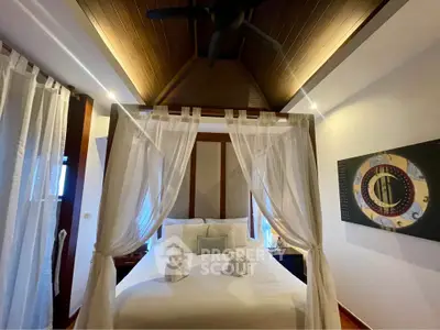 Luxurious bedroom with elegant canopy bed and stylish decor