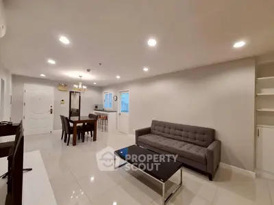 Spacious modern living room with elegant furniture and bright lighting