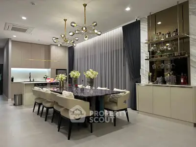 Luxurious dining room with modern chandelier and elegant decor