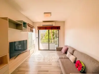 Bright modern living room with balcony and stylish decor