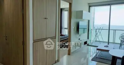 Modern apartment with ocean view balcony and stylish interior design