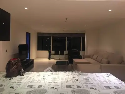 Spacious modern living room with cozy seating and stylish decor