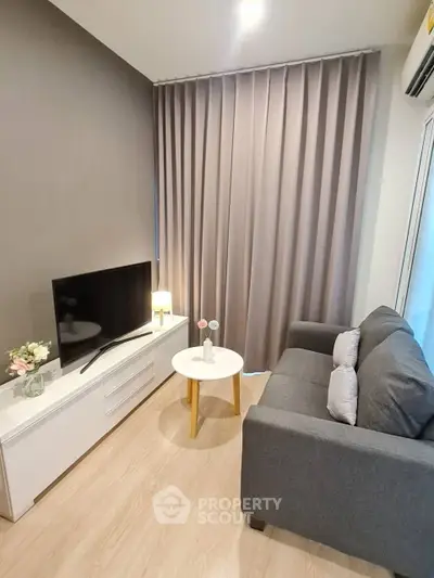 Cozy modern living room with sleek furniture and soft lighting