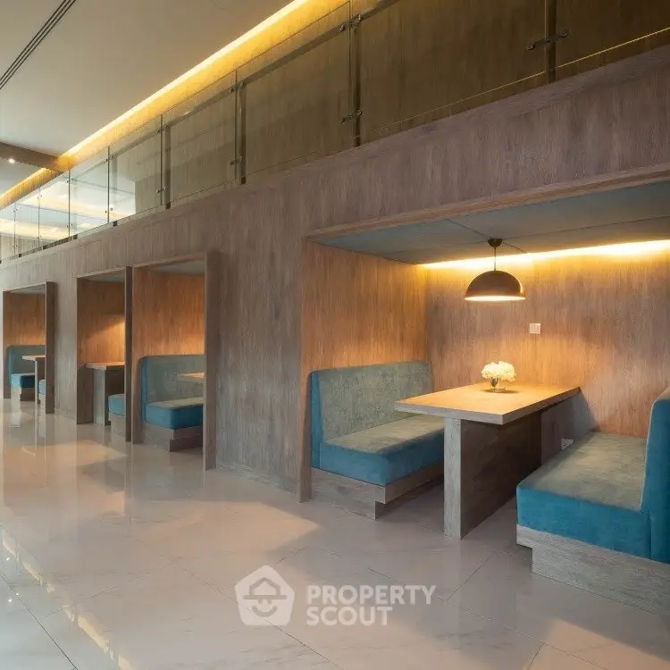 Modern co-working space with stylish booths and ambient lighting