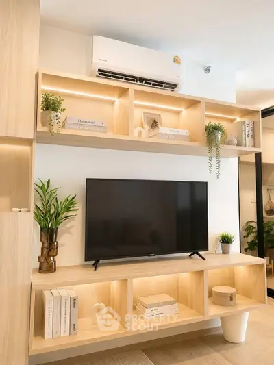 Modern living room with stylish wooden shelves and sleek TV setup