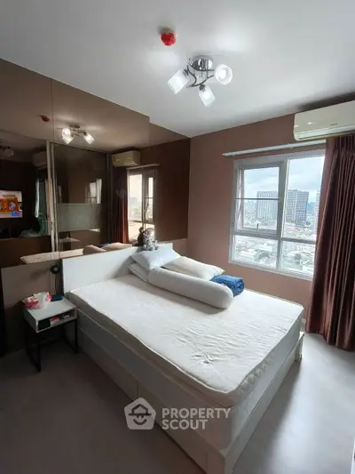 Modern bedroom with large windows and stylish decor