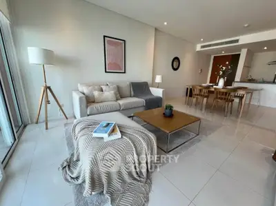 Spacious modern living room with elegant decor and open layout, perfect for relaxation and entertaining.