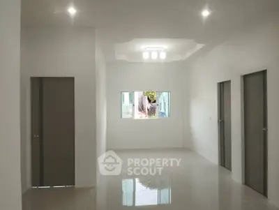 Spacious modern interior with sleek design and ample natural light
