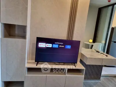 Modern living room with sleek TV setup and stylish decor