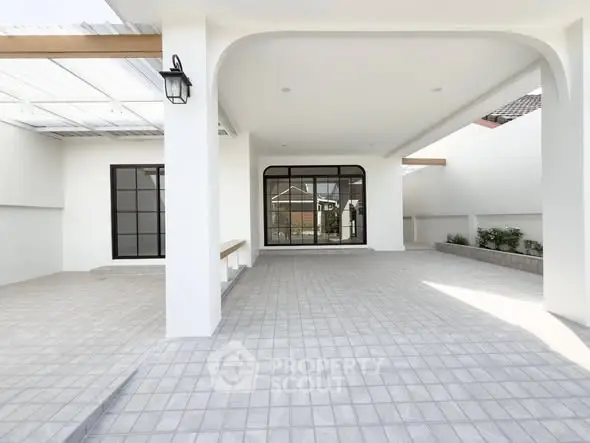 Modern minimalist entrance with sleek design and spacious layout