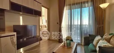 Modern living room with elegant decor and balcony view