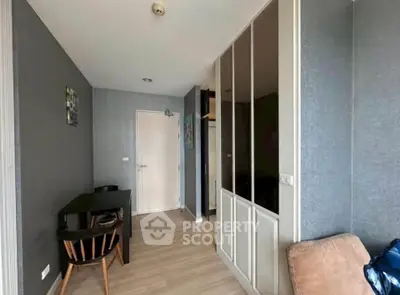 Modern living room with sleek furniture and stylish decor in a contemporary apartment.