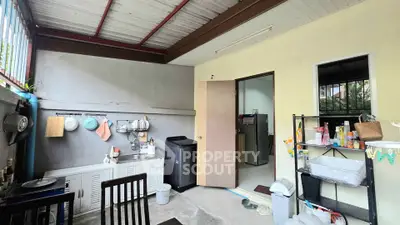 Charming kitchen with open layout and modern appliances, perfect for culinary enthusiasts.