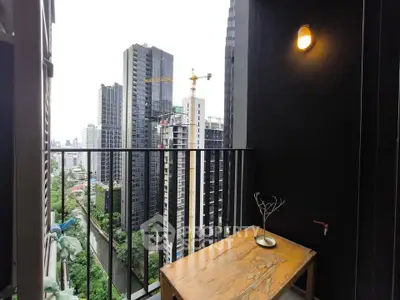 Modern balcony with cityscape view in high-rise apartment