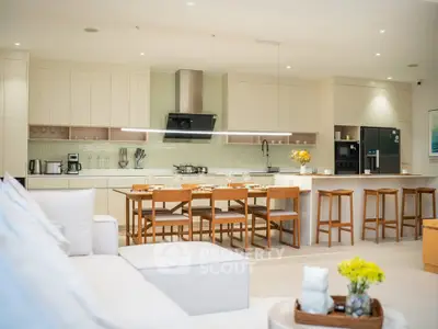 Spacious modern kitchen with open layout and stylish dining area